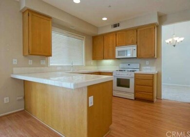 Kitchen with Bar that Opens Up to The Family Room