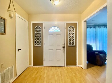 Foyer Area with a coat closet.