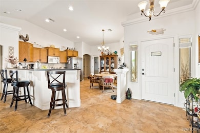 Kitchen featuring stainless steel fridge, visible