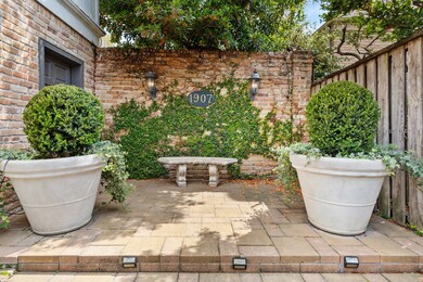 Beautiful landing welcomes guests before the gated door leads to what feels like a secret garden!