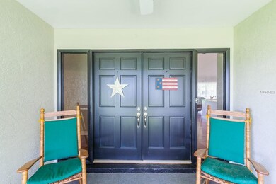 Covered and screened front porch