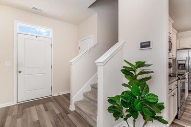 Foyer with light wood-type flooring