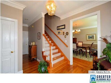 LOOKING INTO OPENING TO THE FORMAL DINING ROOM.
