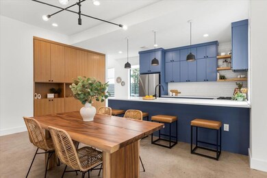 Dining room featuring a chandelier, recessed ligh