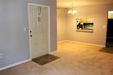 The entryway leads you right into the living room/