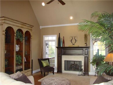 Living Room with Hardwood Floors, Gas Fireplace with Gas Logs, Vaulted Ceiling