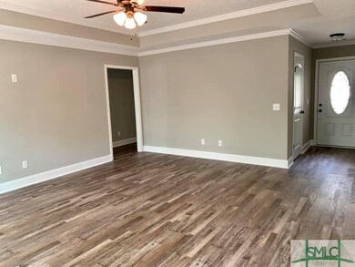 Family Room ~ No Carpet ~ Crown Molding ~ Trey Ceiling