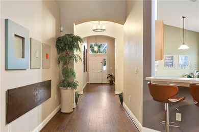 The front door opens to attractive art niches on t