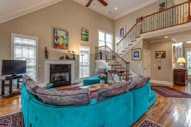 Another view of the spacious family room...notice that the stairway is tucked away and not at the front door?  