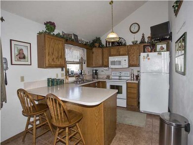 Kitchen has Vaulted Ceiling, Eating Bar, Space Sav