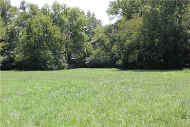 Some of the pasture to right of home that could be used for horses or be built on.