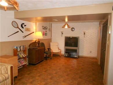Family Room. Another view of the lower level gamer