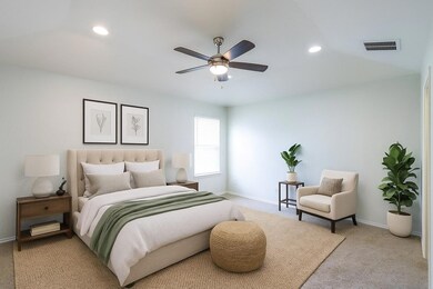 Carpeted bedroom featuring recessed lighting and ceiling fan