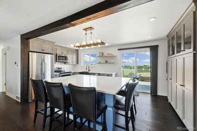 The kitchen remodel included a large center island, all new cabinets, appliances and lots of storage space.