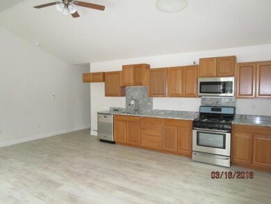 KITCHEN AREA WITH STAINLESS STEEL...