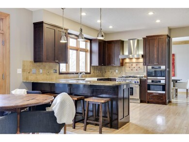 Cherry cabinets, granite counters and marble backs