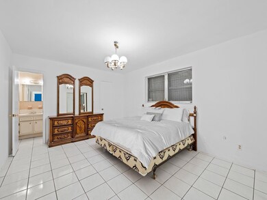 Primary bedroom with ensuite bathroom