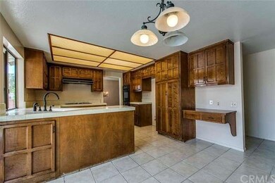 Kitchen with large breakfast nook and glass slider