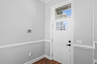 Foyer featuring dark hardwood / wood-style floors