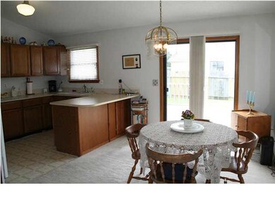 Dining Area right off the Kitchen space. Also, sli