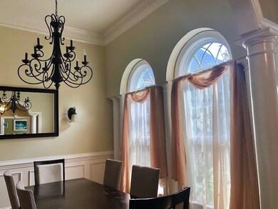 Formal Dining Room w/ Rounded Windows