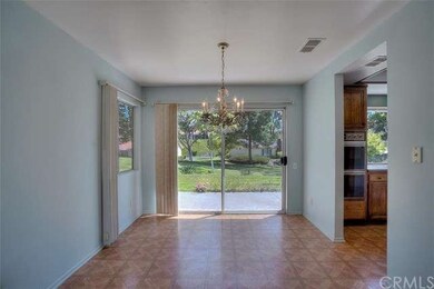 Looking through dining area towards greenbelt and 