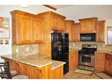 Kitchen. Beautiful kitchen boasting crown molding 