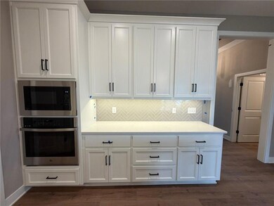 4628 SW Robinson Dr, Raymore, MO 64083 - photo 4