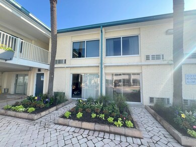 Exterior space featuring brick siding