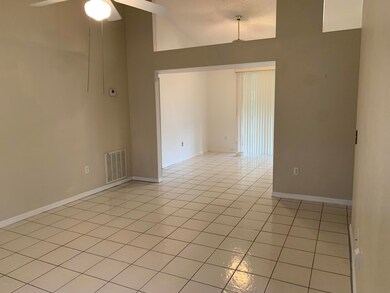 Dining:Living view vaulted ceilings