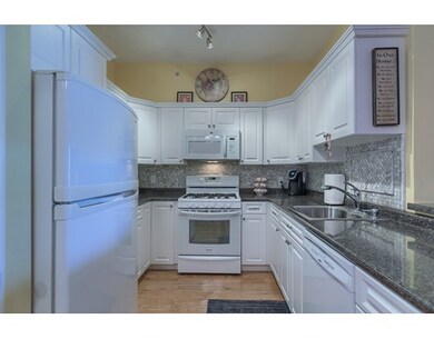 Spicket Commons unit 417, Methuen, MA 01844 - photo 4