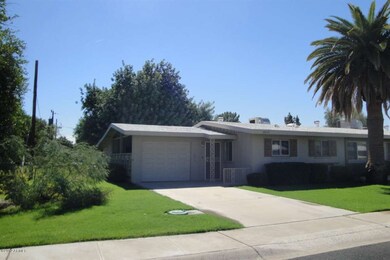 CARPORT WITH GARAGE DOOR