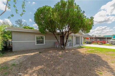 Single story home with stucco siding