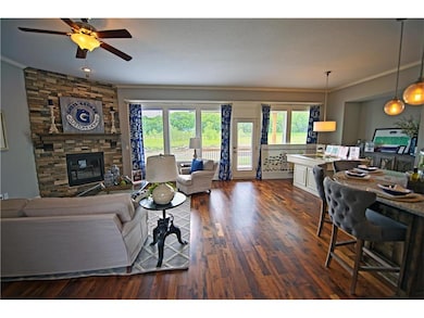 Great Room and Kitchen with Hardwood Floors