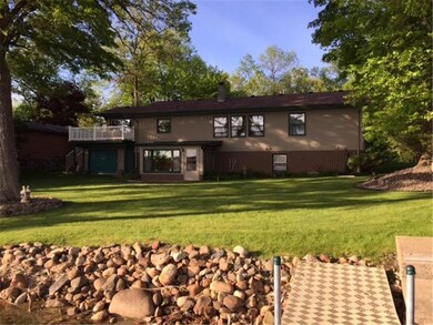 Lake side of home with perfect level lot to the la
