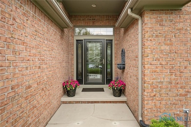Covered private entry with a beautiful new door an