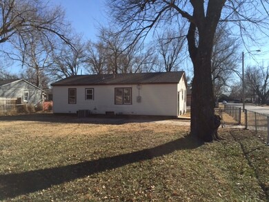 Large fenced back yard coner lot