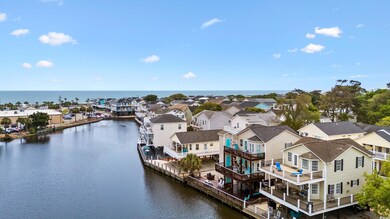 Bird's eye view featuring a water view and a residential view