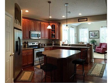 Kitchen. Gleaming hardwood floors, Corian counters