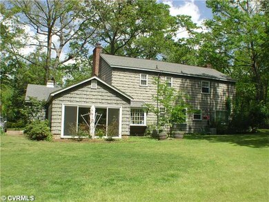 Exterior Back - Private Glassed Porch on the rear