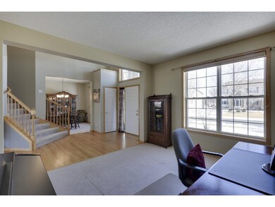 Spacious Foyer leads to Formal Living & Dining Roo