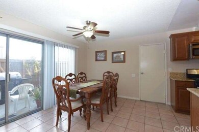 Bright & Spacious Dining Room Leads Out To Your Pa