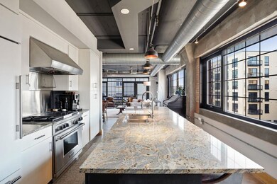 Walls of glass on two sides of the loft