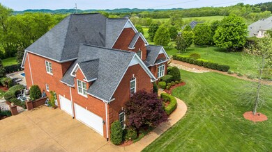 Three Car Side Entry Garage Offers Plenty of Storage and Just a Few Steps Inside. Large Lots Offers Mature Trees & Landscaping.