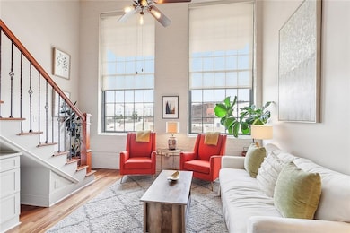 The living room is GRACEFULLY decorated and is flooded with NATURAL light with the massive windows and beautiful view. With the soaring ceiling, it invites you to relax in the gorgeous history and space. The coffee table can convert to a dining table, too!