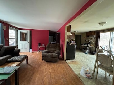 #7- Living room looking into kitchen