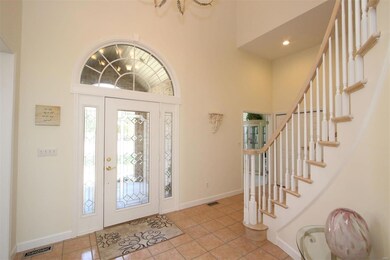 Elegant 19 X 10 Foyer Entry Accented By A Spectacu