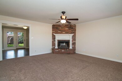 Living room w/cozy brick fireplace