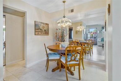 DINING AREA WITH MIRRORED WALL