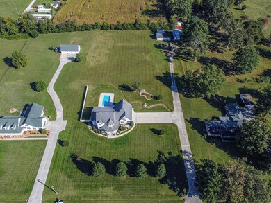 6.18 acres, partially fenced 